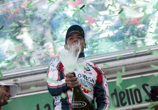 Tour of Lombardy winner Philippe Gilbert uncorks the bubbly in Como.  Photo: © Riccardo Scanferla