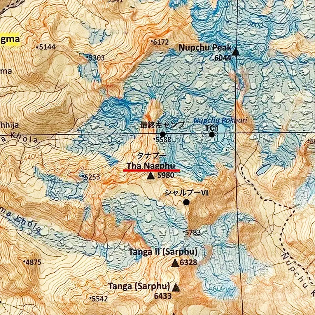 на місцевій карті ця вершина позначена як Та-Нагпу (Ta Nagphu, 5980 м)